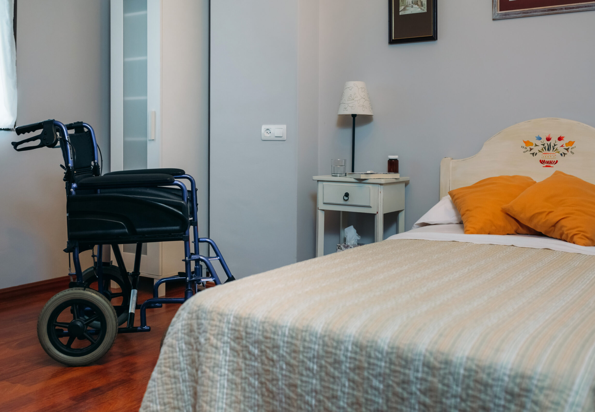 Cozy furnished empty clinic room with wheelchair